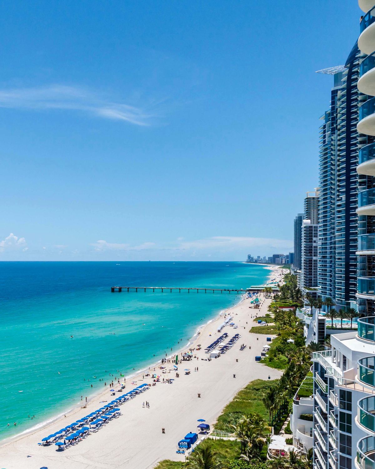 Miami Beach oceanfront skyline with white sand beach