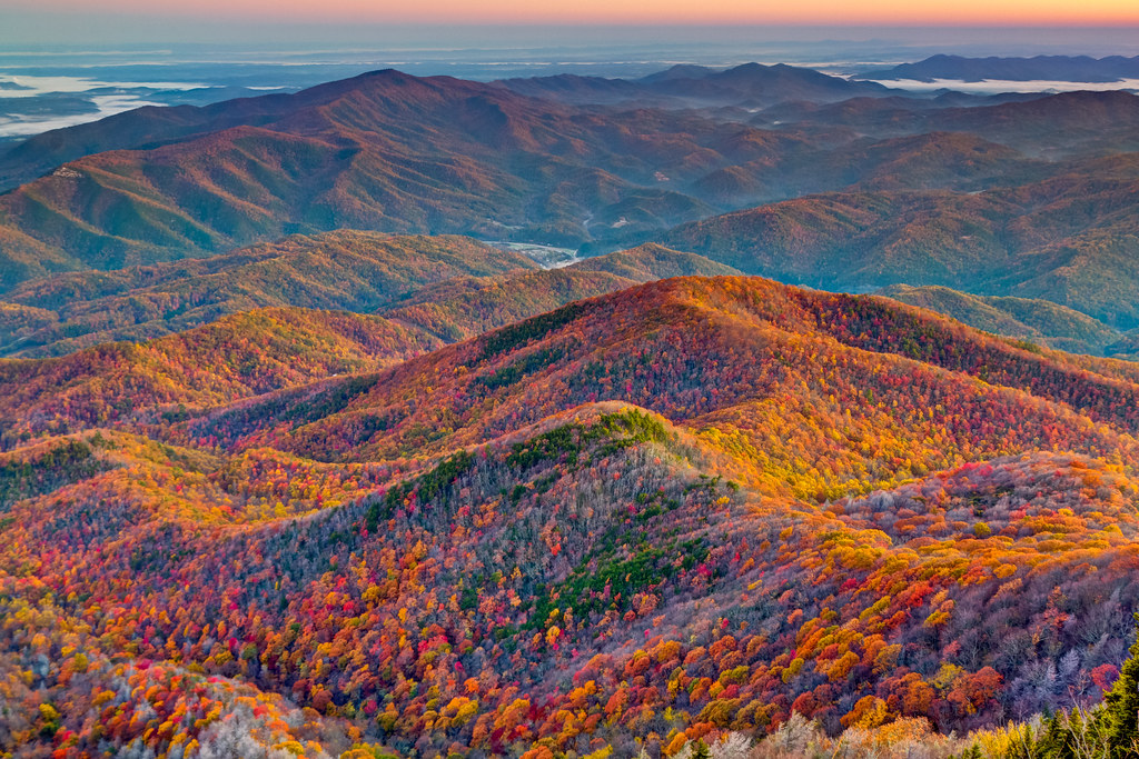 Panoramic view of the Great Smoky Mountains during peak fall foliage with colorful autumn trees and scenic mountain landscapes.